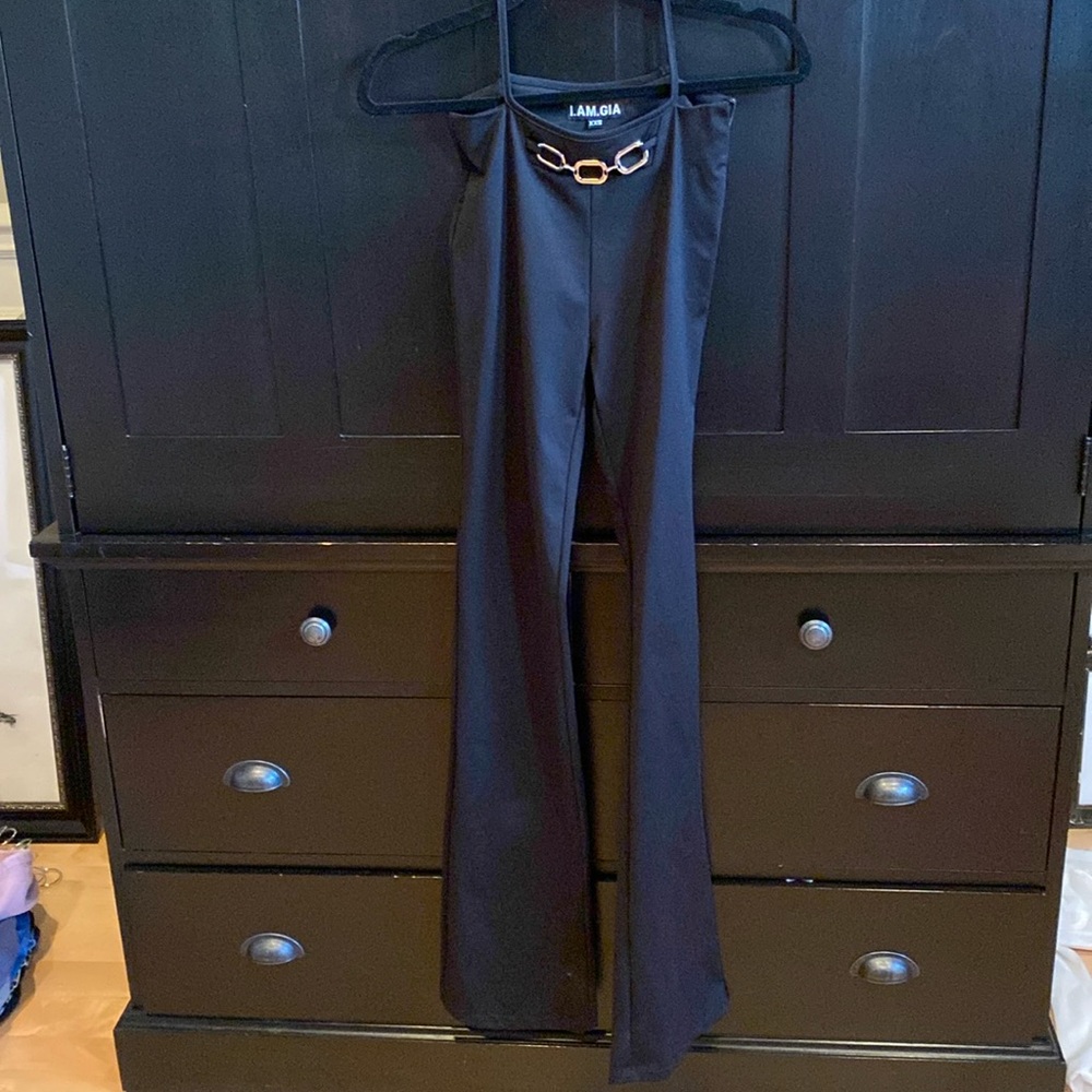 Black high waisted cut out with silver chain flare pants